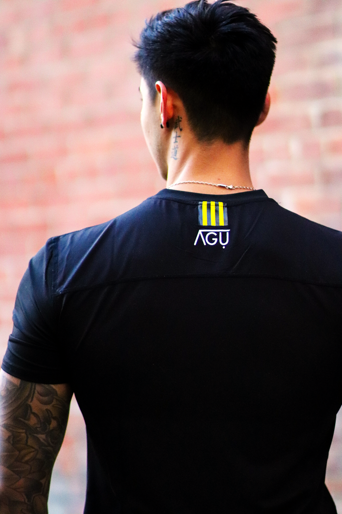 The reverse side of the Agu Premium Athletic Shirt. Black in colour with the our signature band. Top quality and stylish.
